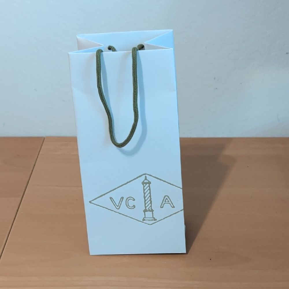 VCA White Gift Bag with Green Handles